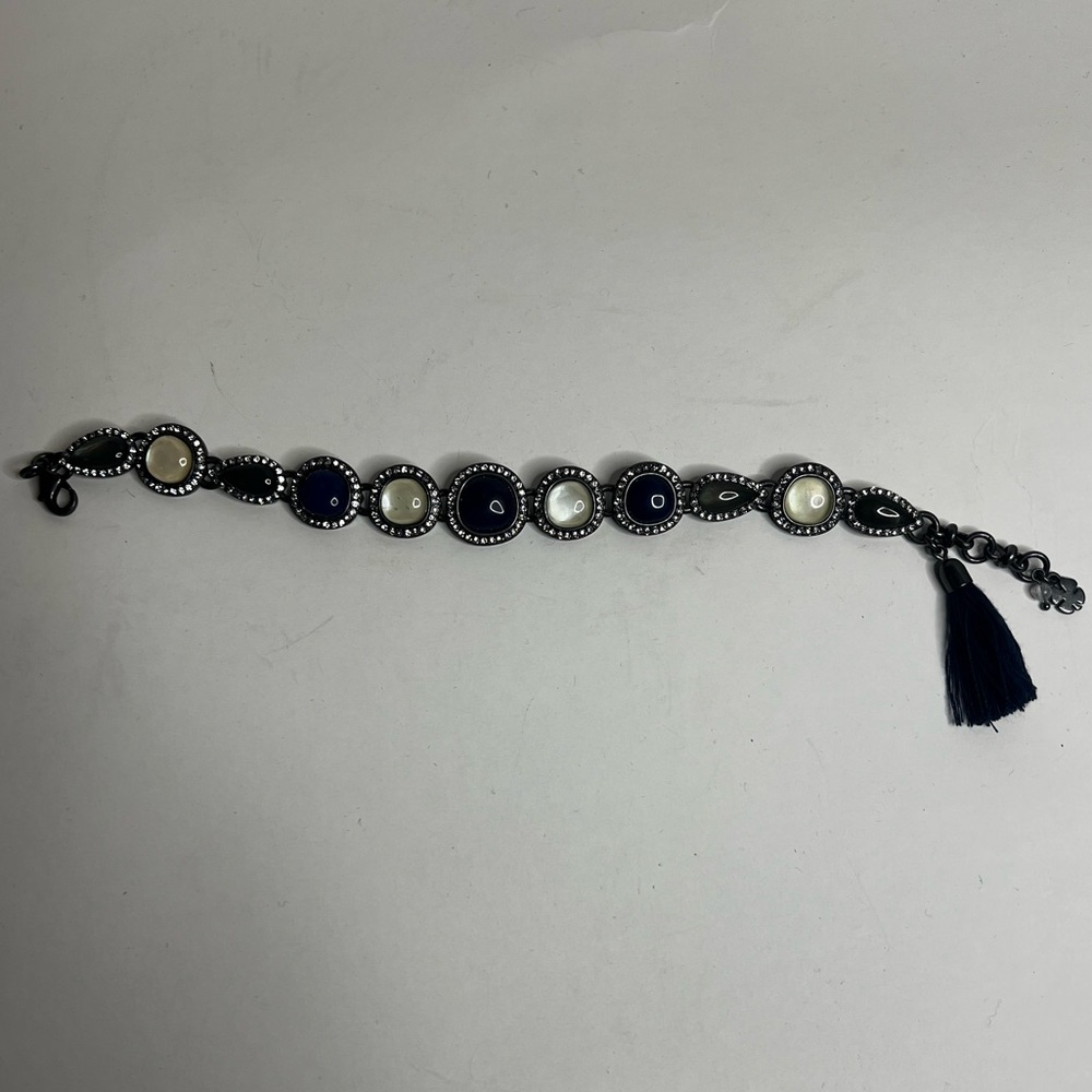 Lucky Brand gemstone bracelet dark blue, white, and back gems